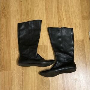 Tall flat leather boots